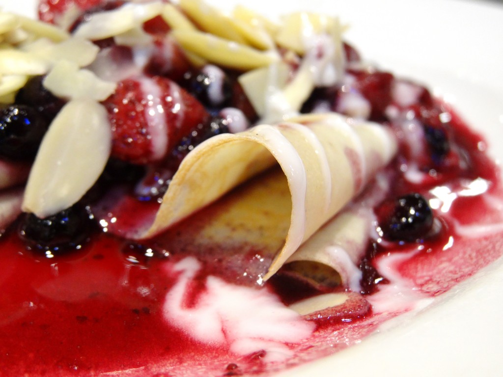 My blueberry and strawberry crêpes! (half with white chocolate sauce)